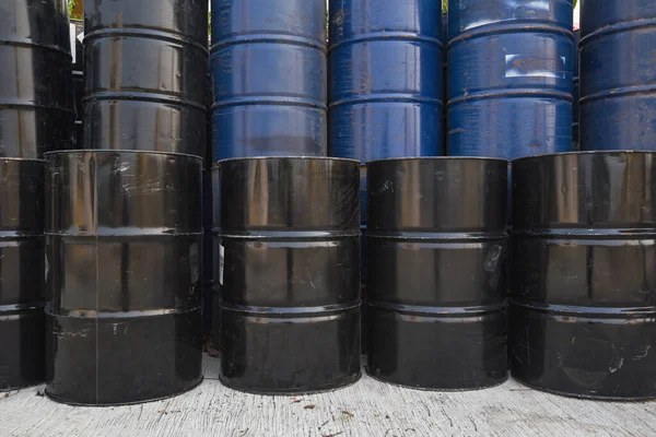 old oil barrels or chemical drums stacked up, industry oil barrel