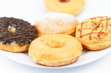 Beyaz üzerine çeşitli çörek