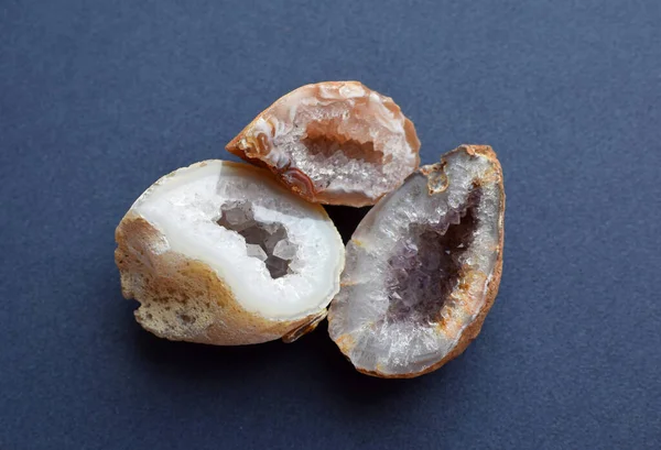 Beautiful quartz geodes. Crystals of amethyst and quartz on a dark background