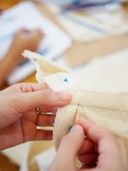 Close up women 's hand sewing — стоковое фото