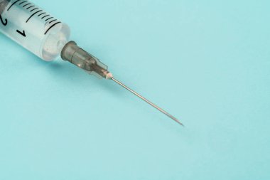 Şırıngalar için somut renk arkaplanı ve şırınga ve ilaçlar için ilaç rengi arkaplanı