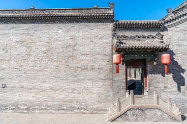 Qiao adında bir tüccarın eski bir Çin malikanesi. 