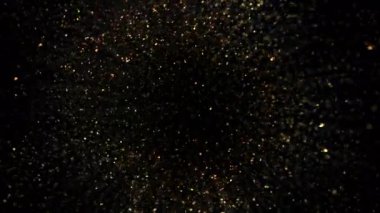 Siyah 1000fps 'te izole edilmiş, Altın Parıltılara doğru dönen Süper Yavaş Film Çekimi. Yüksek Hız Sinema Kamerası, 4K.