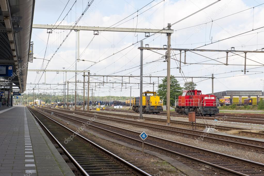 Abandoned train station with industrial locomotives