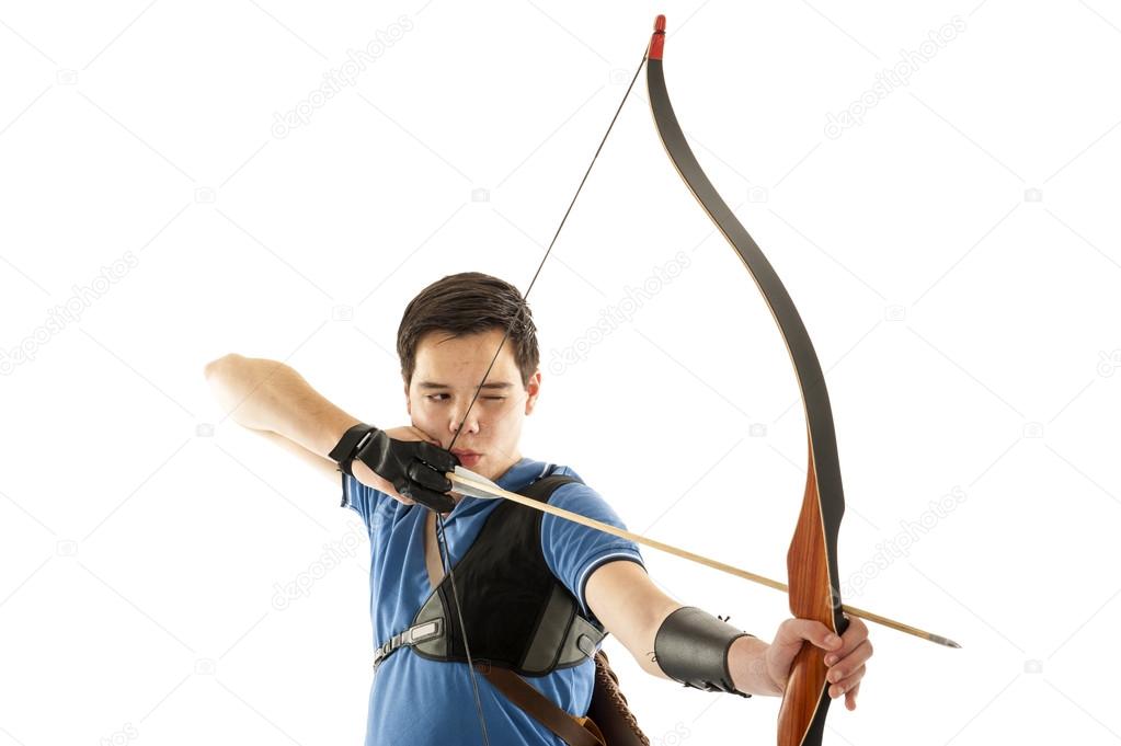 Boy shooting with a longbow
