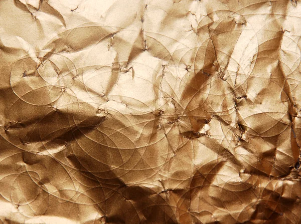 Golden crumpled surface — Stock Photo, Image