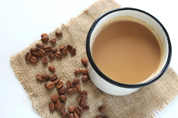 Tazza di caffè e chicchi di caffè — Foto Stock