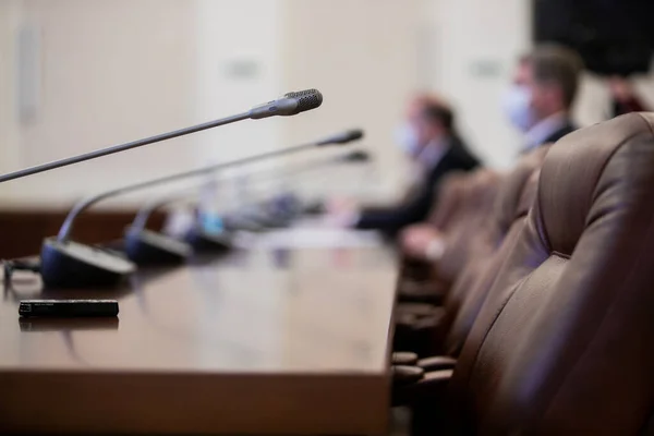 Conference room or seminar meeting room in business event. Session of Government. Academic classroom training course in lecture hall. blur abstract background. working in modern bright office indoor