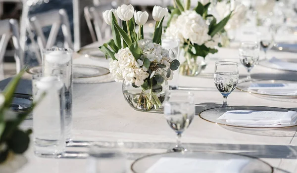 stylish and unusual wedding table and loft decor with flowers