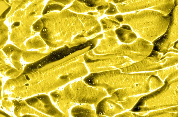 2021年の流行色のヒアルロン酸ゲルが黄色を照らす 酸素の泡で質感の背景 — ストック写真