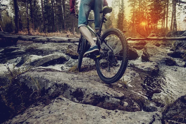 Ride on mountain bike at sunset. — Stock Photo, Image