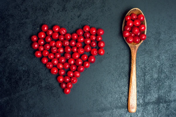 Cherry w formie serca z miarką — Zdjęcie stockowe
