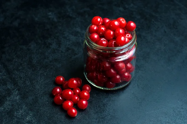 Glass jar full of fruits cherries — Stock Photo, Image