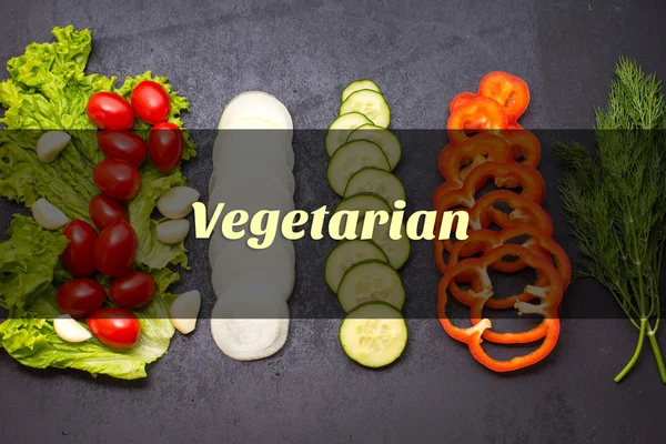 Vegetables, chopping board and knife on a table — Stock Photo, Image