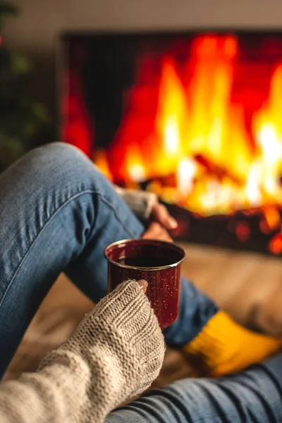 Woman Sweater Warm Socks Sitting Front Fireplace Which Depicted Screen — Stock Photo, Image