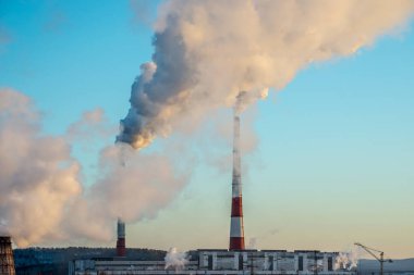 Çevre kirliliği ve fabrikaların bacasından atmosfere karbondioksit salınımı nedeniyle küresel ısınma sorunu