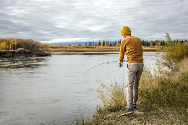 Young Man Fisherman Yellow Sweater Hat Fishing River Bank Autumn — Stock Photo, Image