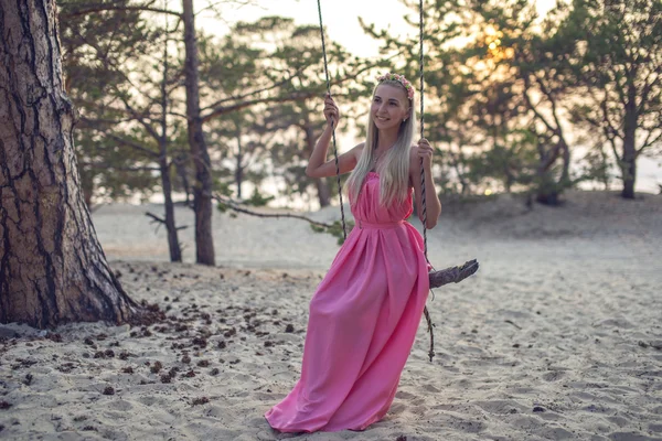 Cute, young girl on a swing — Stock Photo, Image