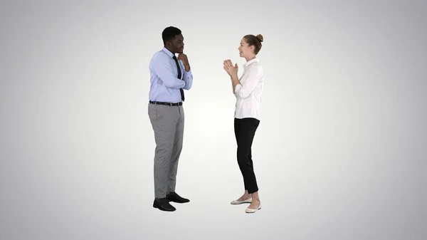 Business woman giving some ideas to her boss on gradient backgro — Stock Photo, Image