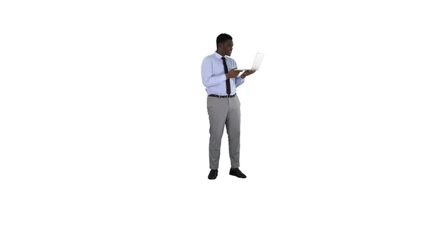 Cheerful successful young African American manager with laptop h — Stock Photo, Image