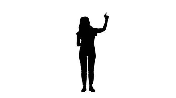 Silhouette Lächelnde Frau in lässiger Kleidung präsentiert etwas, — Stockfoto