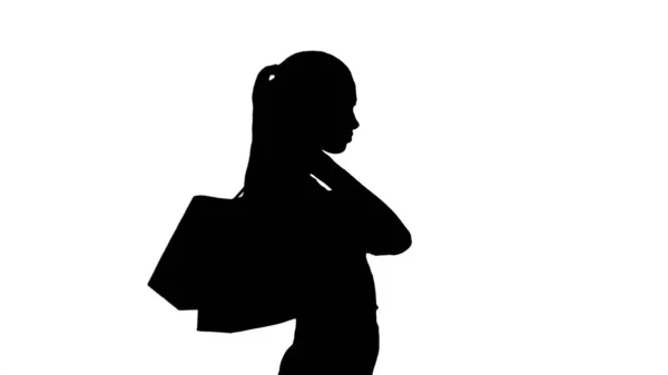 Silhouette Beautiful smiling woman in formal dress walking with — Stock Photo, Image