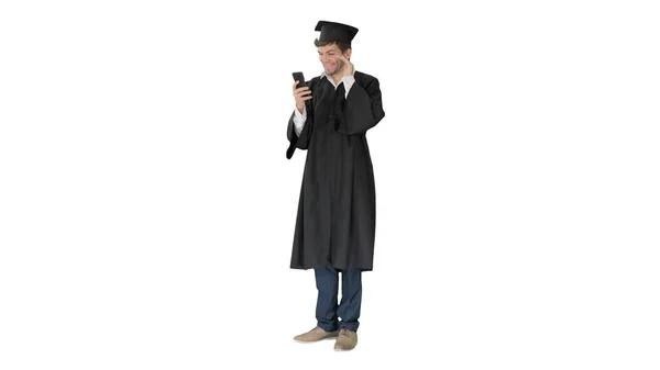 Laughing male student in graduation gown and mortarboard having — Stock Photo, Image