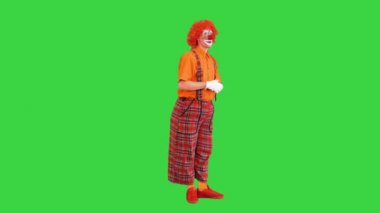 Yeşil Ekran, Chroma Anahtarı üzerinde hayali dijital veya sanal ekran kullanan palyaço.