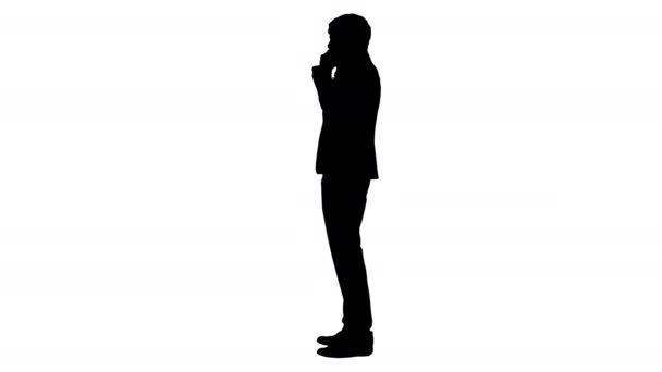 Silhueta Empresário estressado e irritado falando ao telefone. — Vídeo de Stock