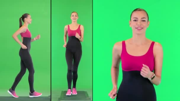 Mosolygó és beszélő sportos nő fut a zöld képernyőn, Chroma Key. — Stock videók