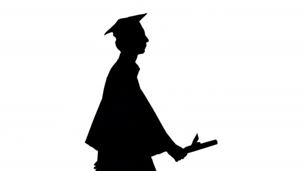 Silhouette Graduate diák séta és mosolygós. — Stock videók