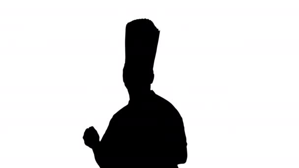 Silhouet Rijpe chef-kok met baard en in wit uniform dansen. — Stockvideo