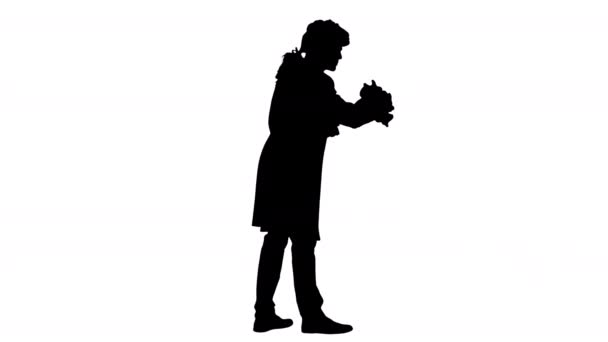 Silhouet Man verkleed als Mozart begroet iemand. — Stockvideo