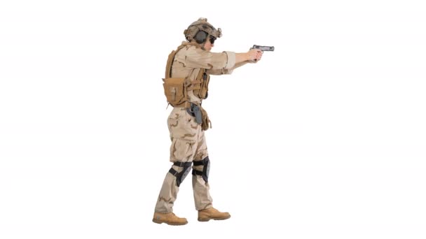 Marine walking with pistol and shooting on white background. — Stock Video