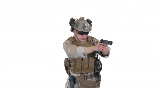 Army man pointing gun in multiple directions ready for combat on white background. — Stock Video