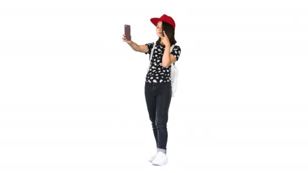 Asiatico scuola ragazza presa selfie su bianco sfondo. — Video Stock