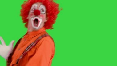Yeşil Ekrandaki birinden kaçan komik palyaço, Chroma Key.