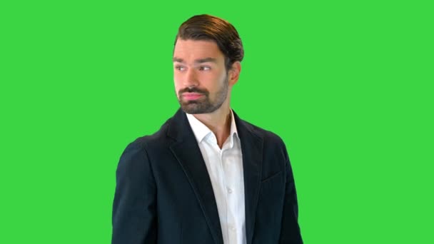 Business man waiting and using a smart watch to check message on a Green Screen, Chroma Key. — Stock Video