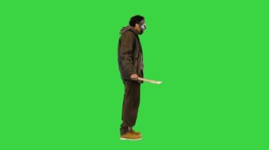 Korkunç karakter Yeşil Ekran 'daki kötülük gibi gülüyor, Chroma Key.