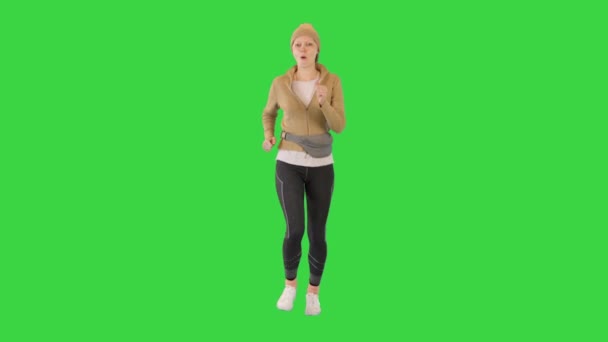 Žena fitness sportovní běžec běhání venku na zelené obrazovce, Chroma Key. — Stock video