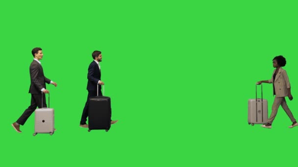 Business colleagues on a business trip meeting at the airport on a Green Screen, Chroma Key. — Stock Video