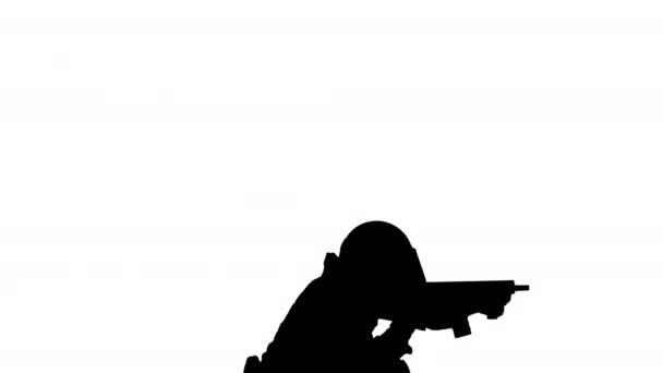 Silhouette Підрозділ спецназу, який стріляє з сидячої позиції . — стокове відео