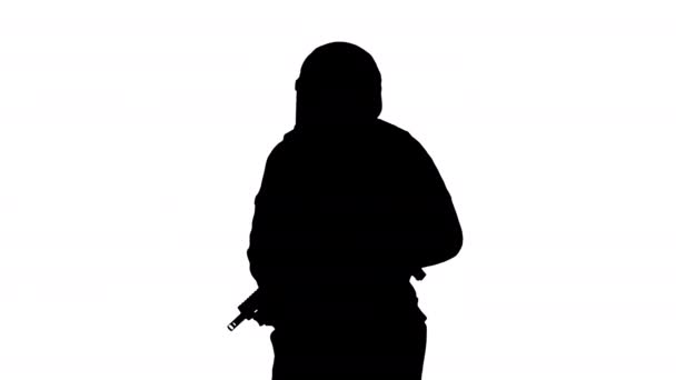 Silhouette Unità tattica della polizia con un fucile che cammina. — Video Stock