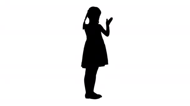 Silhouette Delighted girl in black dress clapping her hands. — Stock Video