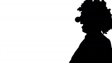 Siluet Palyaço komik bir şekilde yürüyordu..