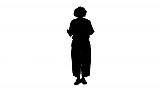 Silhouette clown felice in possesso di una scatola con un regalo. — Video Stock