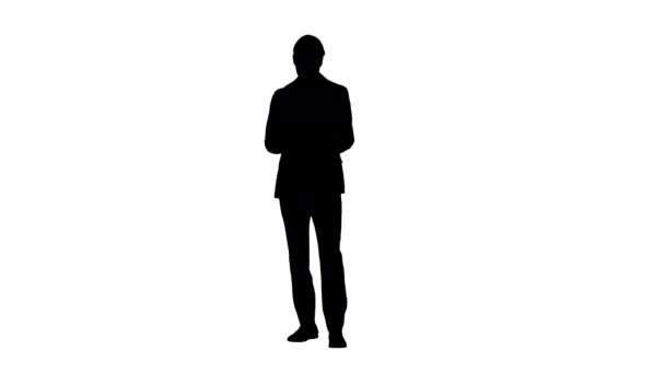 Silhouet Jonge zakenman op zoek naar de documenten. — Stockvideo