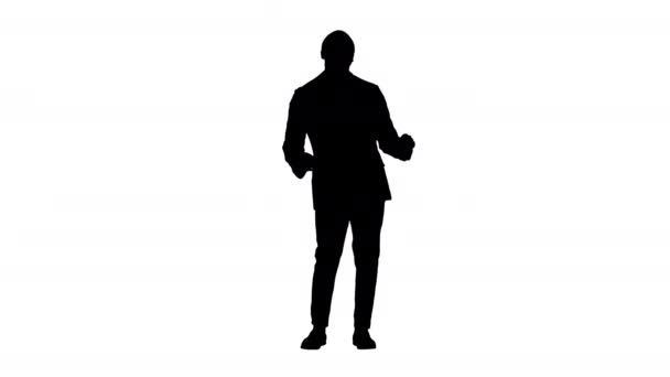 Silhouette Schwarzer Geschäftsmann feiert und tanzt. — Stockvideo