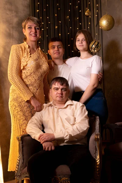 Family portrait near Christmas tree — Stock Photo, Image