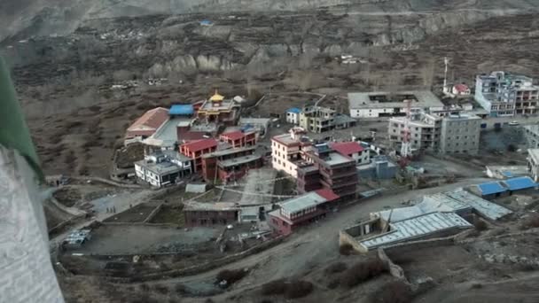 A beautiful mountain village in Nepal surrounded by the terraced hillside. — Stock Video
